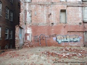 An AUFL tag in a brick courtyard in the West Bottoms in Kansas City, MO. Who have you decided is "Awful"?