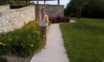 My mom picking our flowers at a local state park