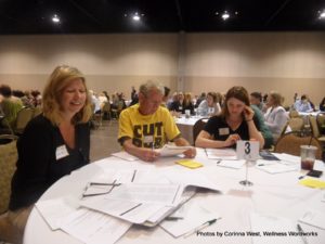 David Flora with the Please Cut Our Budget T-shirt at the Kansas Medicaid Reform forum