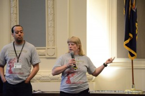 Corinna West and Christopher Swope sporting the UnDiagnosing Emotional Distress T-shirt at Startup Weekend KC for Connect Power's launch. The site is now half built.