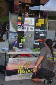 brian setting up table Brian Gallmeyer, my bicycle tourning partner, setting up the Wellness Wordworks display table at Bike for the Brain on Labor Day this week.