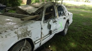 This is Edward Duff's car after the Joplin tornado. He flew 1/2 mile in the car and landed with this beam inches from his face.