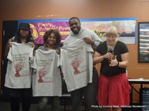 Winners of Poetry for Personal Power in St. Joseph, MO, holding up their UnDiagnosing Emotional Distress T-shirts.