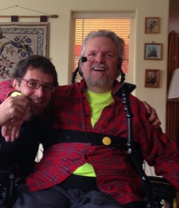 David Oaks, giving a hug to filmmaker Daniel Mackler during a recent visit