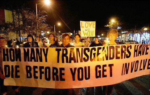 Protesters march to celebrate trans people who have died at the 13th annual International Transgender Day of Remembrance