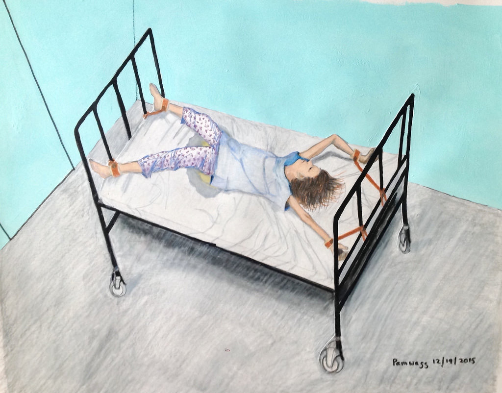 Ariel view of a person restrained on a white bed with a black bed frame, blue walls