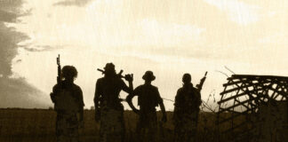 A Bill to Explore the Relationship Between Veteran Suicides and Prescription Medication a silhouette of four soliders