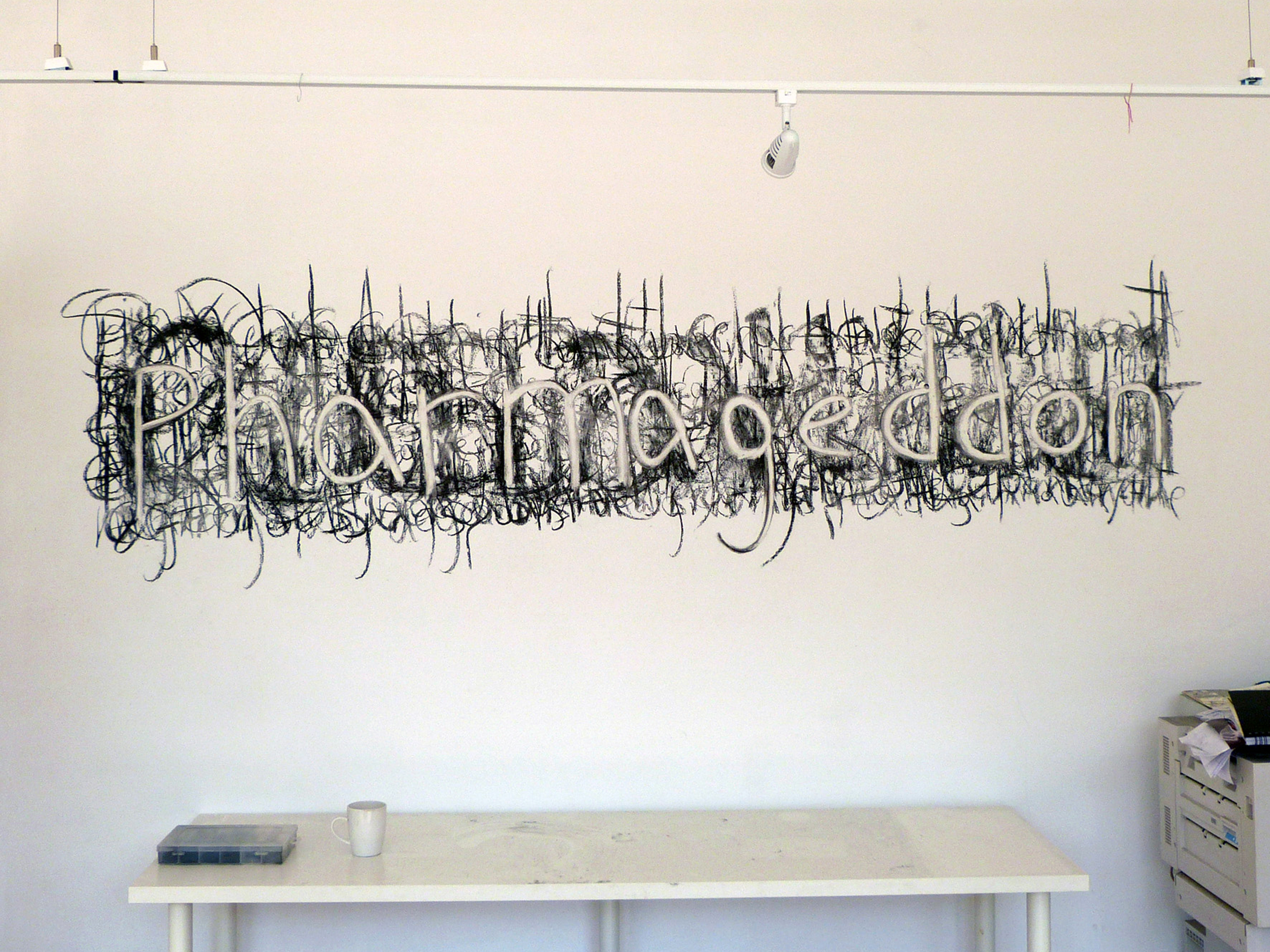 Black scratch pattern on a wall with the word "pharmageddon" written in negative space