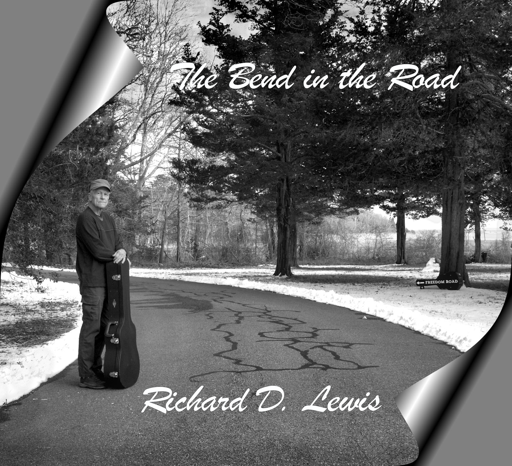 A photo of a road in black and white with the title of the album "The Bend in the Road"