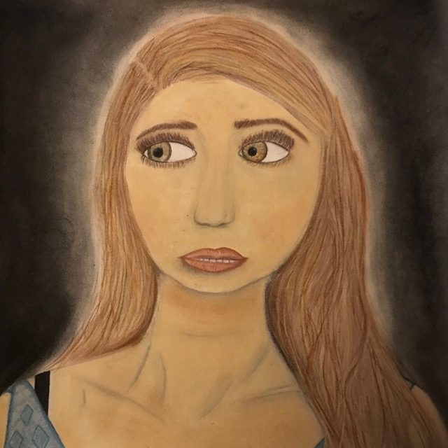 Women with blonde hair looking anxiously towards left