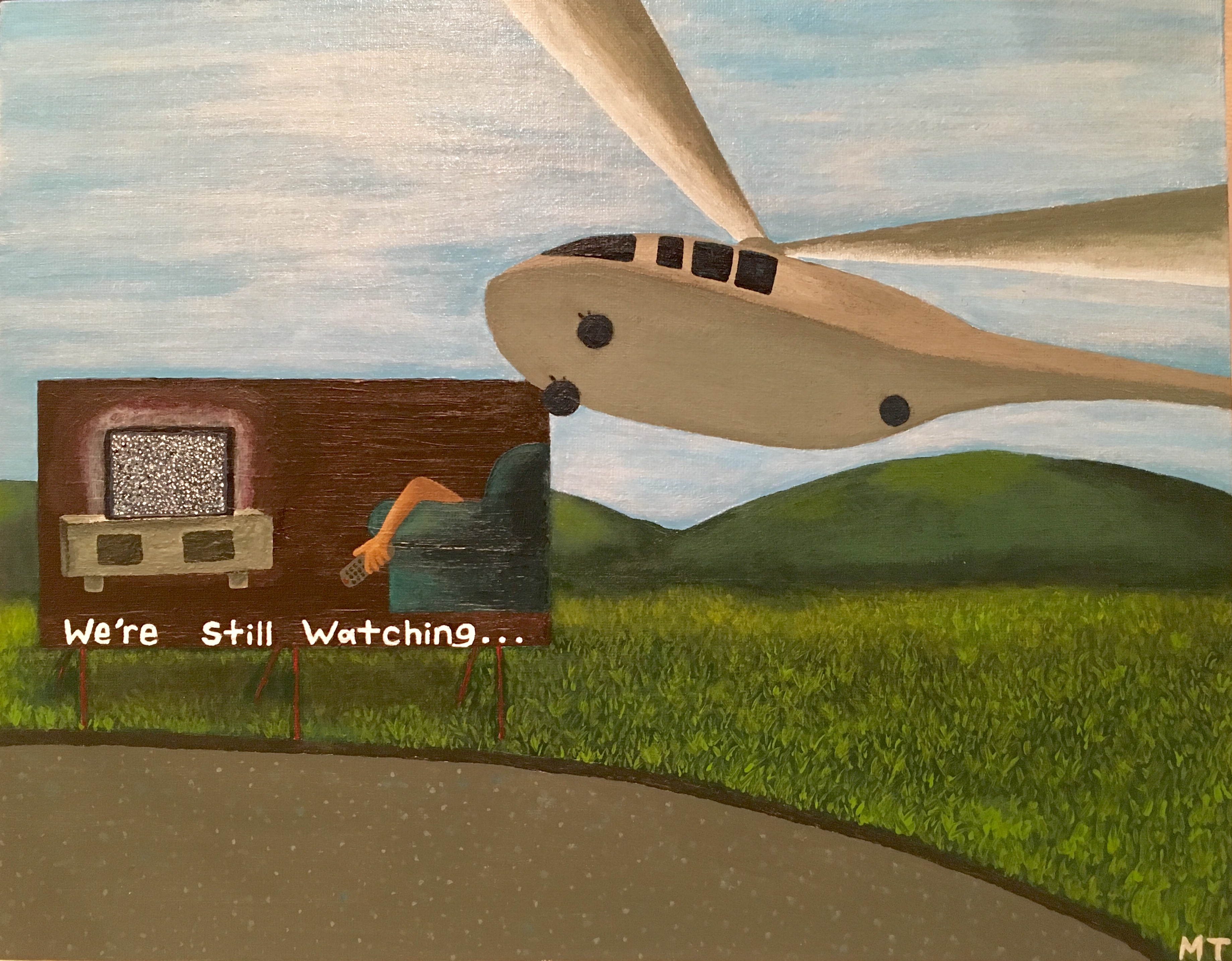 An image of a helicopter by a billboard