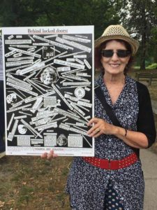 Dorothy Dundas holds her poster telling the story of her psychiatric file