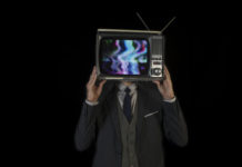 The Perils of Direct-to-Consumer Advertising man wearing suit with tv for head