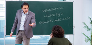 Psychiatry and the Stupidification of America Teacher lecturing student. Blackboard reads "Depression is caused by a chemical imbalance"