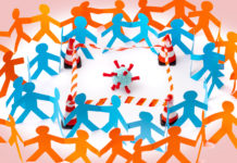 US Considering Policies That Will Lead to Mass Death Of Psychiatric Patients papercut figures surrounding quarantined COVID virus