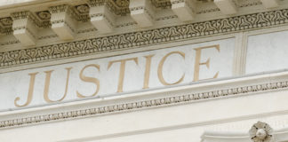 UN Report: Involuntary Psychiatric Interventions “May Well Amount to Torture” the word justice engraved on a courthouse