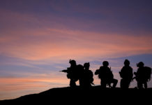 The Persistent, Misdirected Search for Causes of Trauma-based Suffering silhouette of soldiers