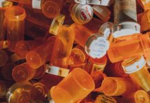 The Impoverishment of Psychiatric Knowledge Empty plastic pill bottles.