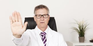 Missing a Pivotal Outcome in a Large Cold Turkey Trial of Desvenlafaxine doctor making "stop" hand gesture