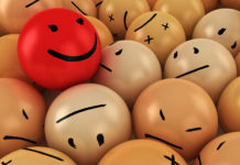 There’s Something Spreading Faster Than COVID-19, and It’s Not Fear. It’s Toxic Positivity creepy happy ball in ball pit