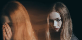 Dear “Psychology Today”: Believe Incest Survivors woman blurry reflection