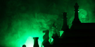 Identity, Oppression, and the Culture of “The Mentally Ill” chess pieces arranged on stairs