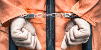 When Psych Diagnosis Means Life-or-Death Handcuffed hands of a prisoner