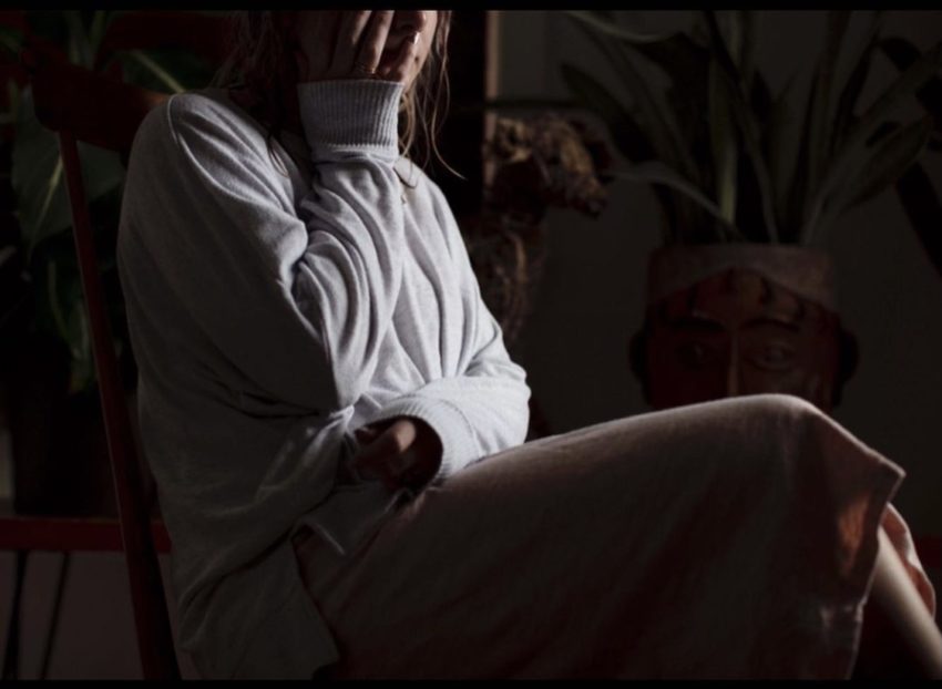 Photo of girl holding her face