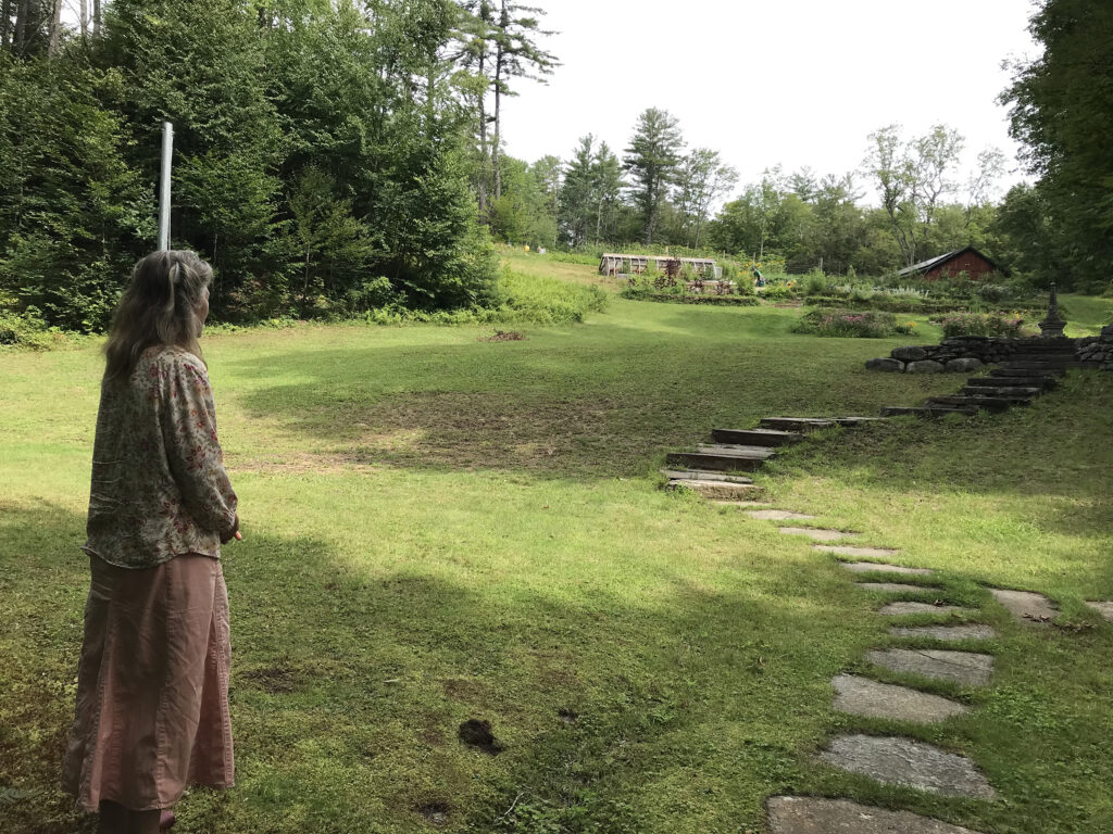 Beatrice Birch looks out on a path at Inner Fire