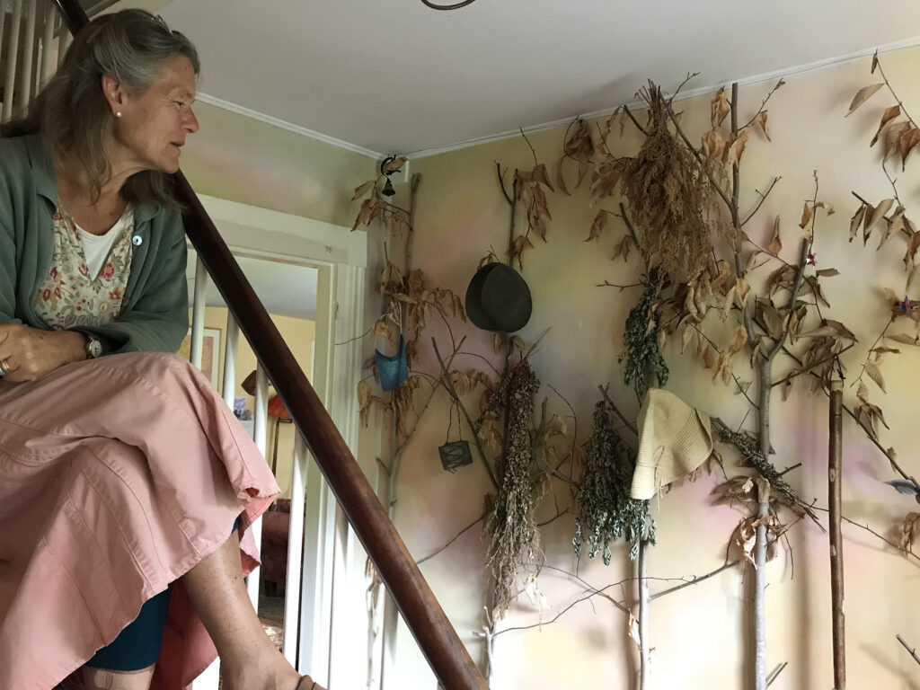 Photo of Beatrice Birch with sapling coat hangers