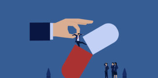 Fate of a Whistleblower: I Spoke Out About Abrupt Med Withdrawal Illustration of a businessman being pulled out of a pill capsule