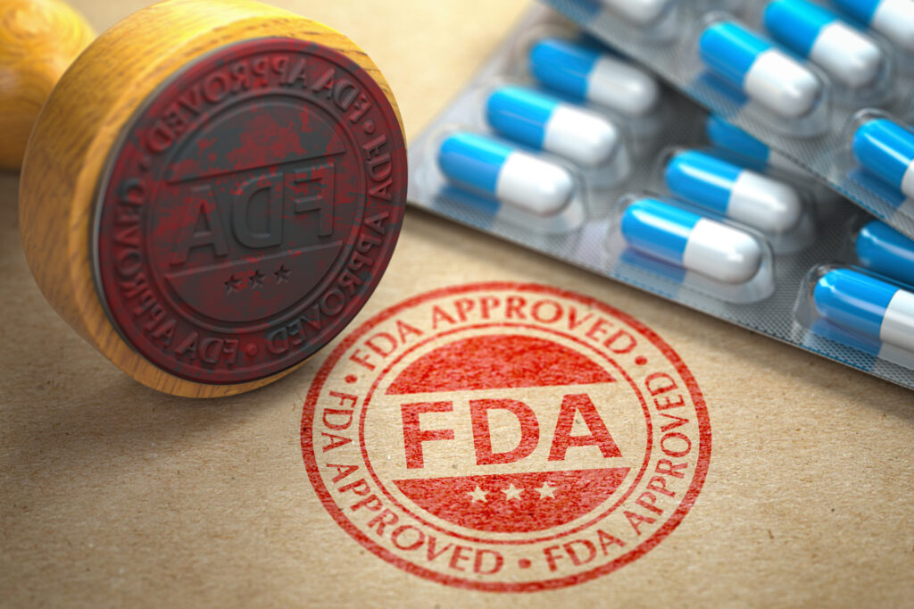 FDA approved concept. Rubber stamp with FDA and pills on craft paper. 3d illustration