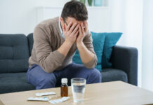 What Helps Long-Term Users of Benzodiazepines and Z-Drugs Discontinue? Picture of distressed man facing pills
