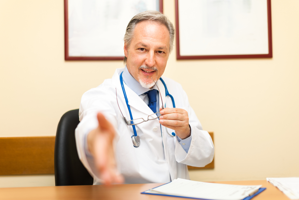 Doctor welcoming a patient