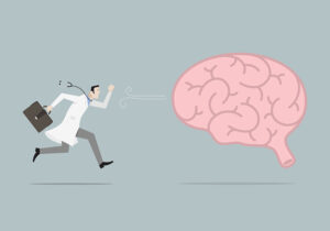 An illustration of a doctor running after a brain.