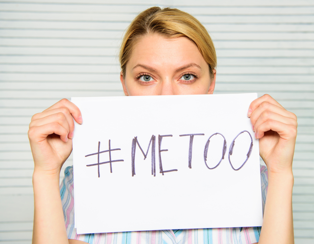 Woman holding #MeToo poster