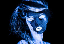 Mad by Design: An Ancient Paradigm of Psychiatric Thought Photo of a face painted, glowing in ultraviolet light