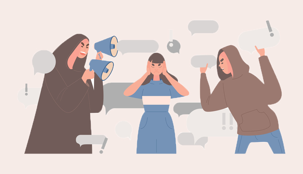 A vector illustration: A female-presenting figure in the middle holds her ears; a figure to her left shouting into a megaphone; a figure to her right throwing speech bubbles at her