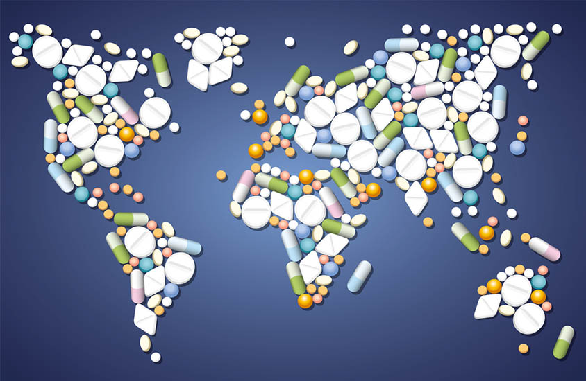 A map of the world constructed entirely out of pills, on a blue background.