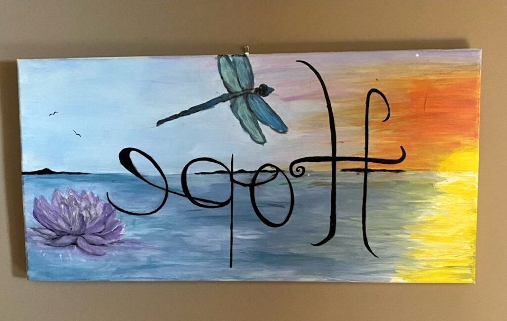 A painting depicting a bright sunset over the sea, with a dragonfly and a lotus flower. The word "Hope" is written in mirror writing.