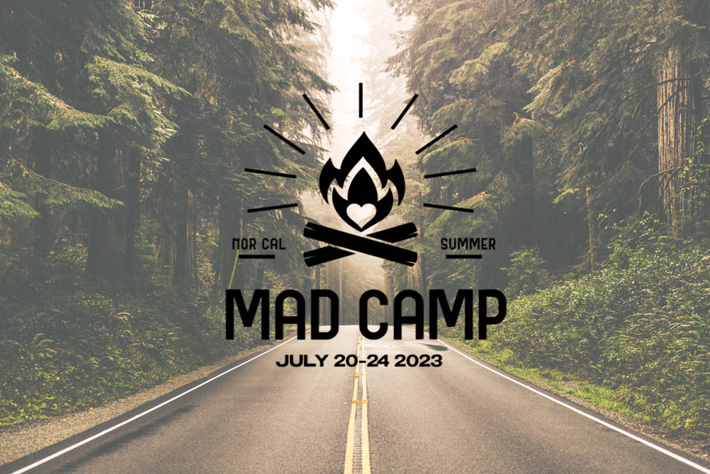 A background of a road leading through a forest. Text over it reads: "Mad Camp July 20-24 2023"