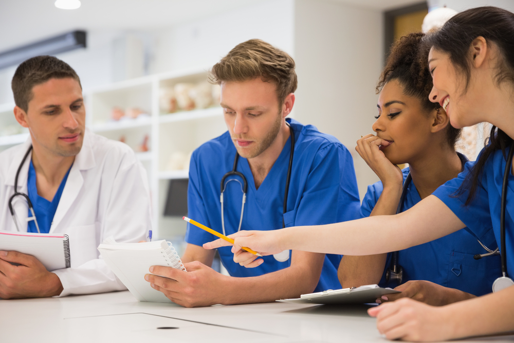 Medical students sitting and talking at the university