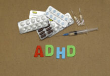 Critical Psychiatry Textbook, Chapter 9: ADHD (Part One) Pills against a brown background. The word "ADHD" is beneath.