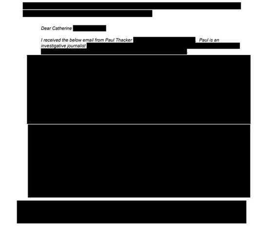 A letter that is almost completely blacked out (redacted)