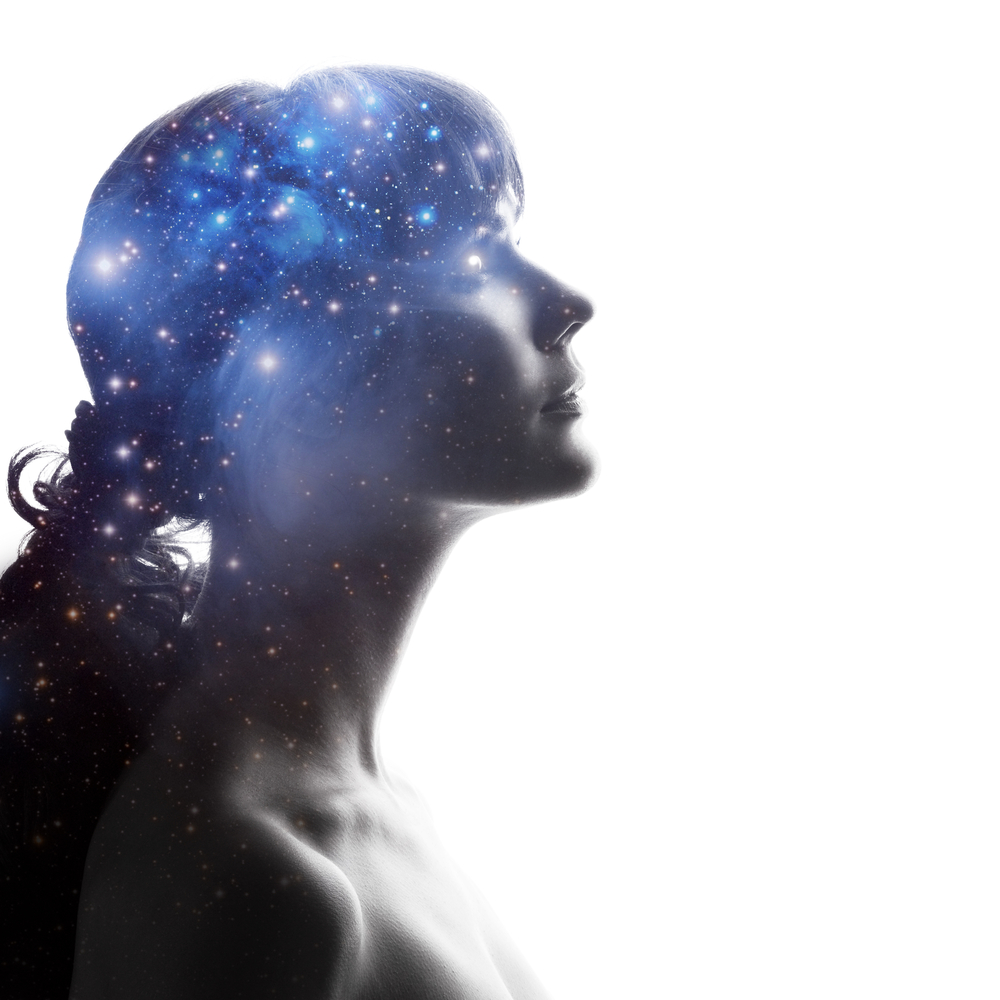 Profile of a woman with the cosmos as a brain. The scientific concept. The brain and creativity. Elements of this image furnished by NASA.