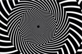 Black and white optical illusion of lines that seem to move and spin