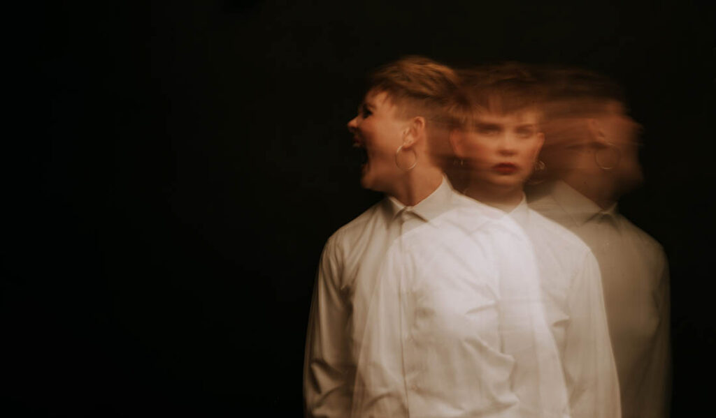 Double exposure photo of a person experiencing distress