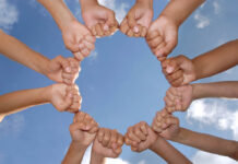 How We Started the Bay Area Hearing Voices Network Hands together against the sky