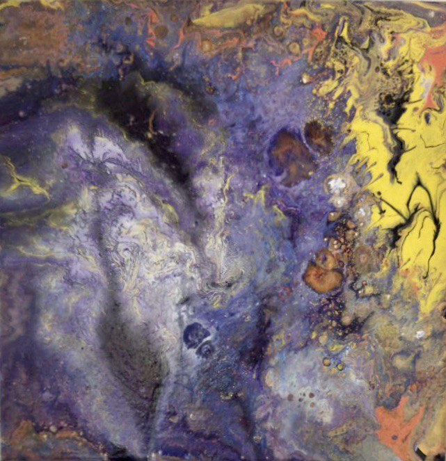 Swirls of paint in violet blue, yellow and orange