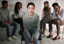 Photo of young woman in a therapy group